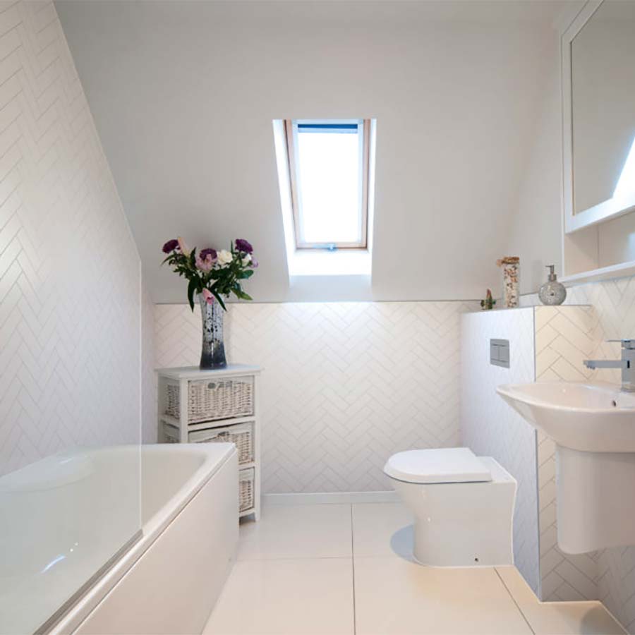 Herringbone white bathroom wall panels
