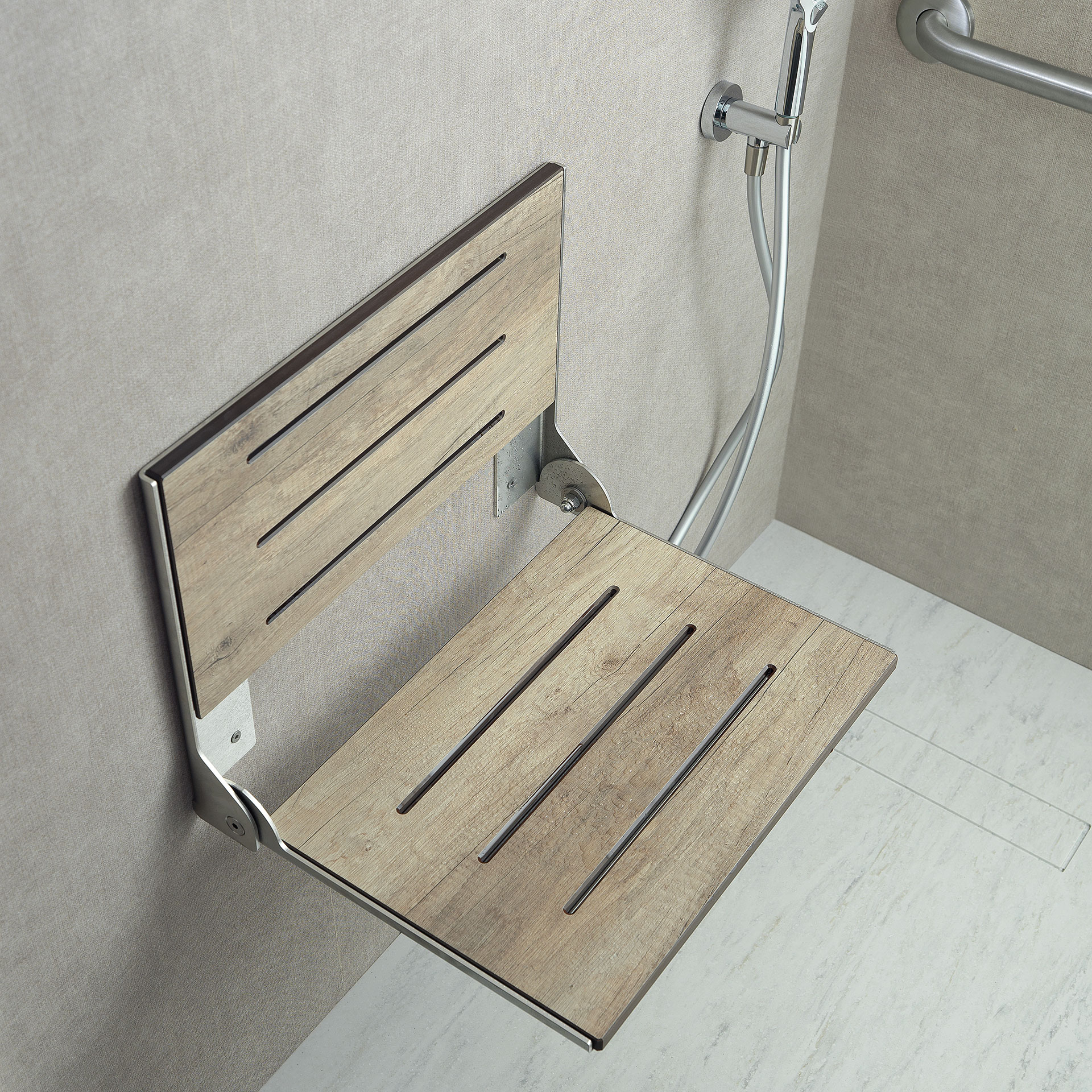 Faux weathered teak shower seat folds up when not in use