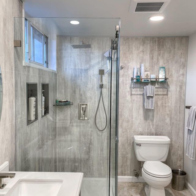 Frameless 2-sided glass shower enclosure