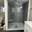 gray wall panel with low profile base 