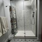 Glass enclosure wood return 