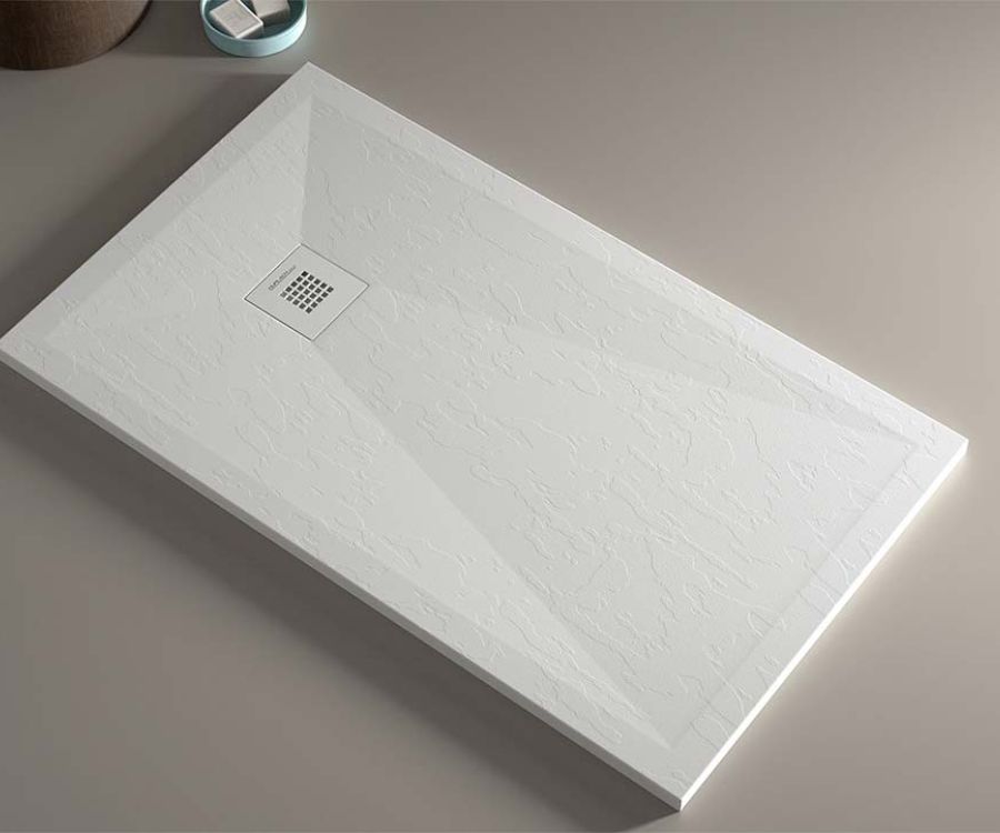 White cultured stone shower base