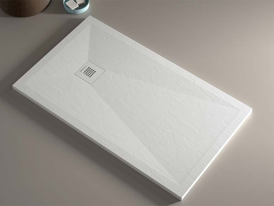 Low profile shower base